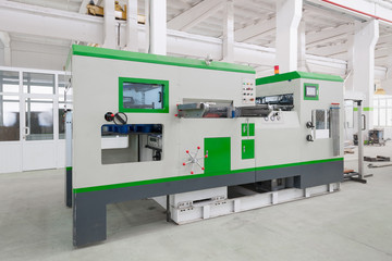 lathe and equipment at a manufacturing plant