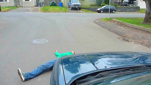 Person Walking Gets Hit By Speeding Car On Street.