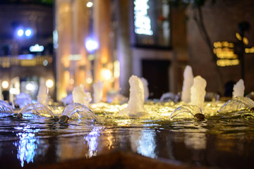 Beautiful small evening fountain with light in Hong Kong. Public holiday destination