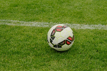 Soccer ball by the goal line