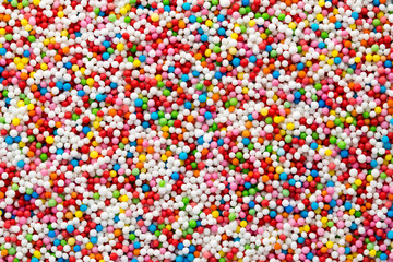 Multicoloured sweet sugar balls. Small ball pattern.