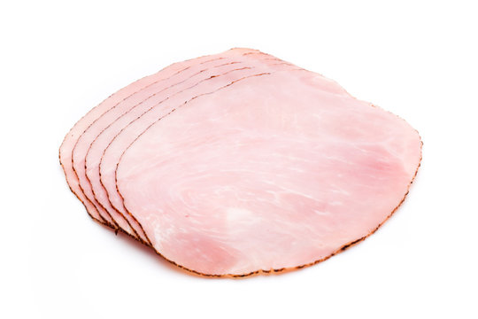 Thin slices of ham on white background.