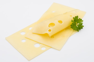 Cheese slices on white background cutout.
