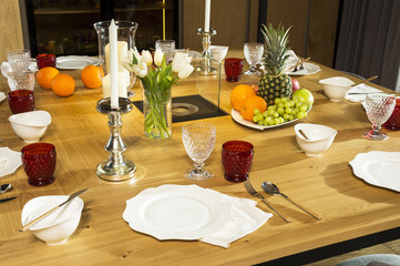 decorated table with flowers and fruits