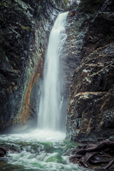 Fototapeta premium Mountain waterfall at fall