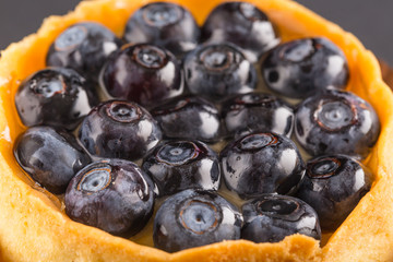 Fragment of vake a dessert with bilberry