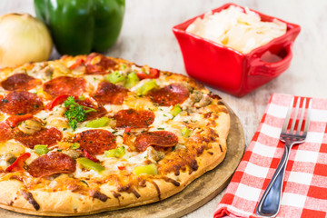 Pizza Pie With Pepperoni and Onion and Green Pepper