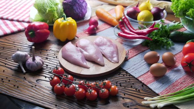 nice and colored food composition of Chicken breast and genuine and fresh ingredients for diet and low calories. Chicken healthy diet and hight proteins diets for food. Vegetables table top