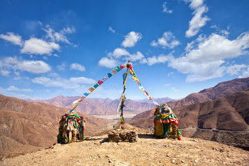 Prayer flags in Tibet with mountain background