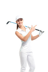 Pretty woman golfer posing with golf club on white background in studio