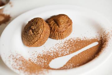 Freshly Baked Muffins On A White Plate
