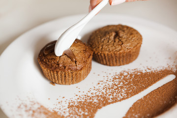 Freshly Baked Muffins On A White Plate