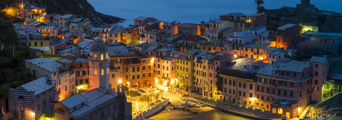 Vernazza, Cinque Terre, La Spezia, Liguria, Italy. Panoramic view of the village at dusk.
