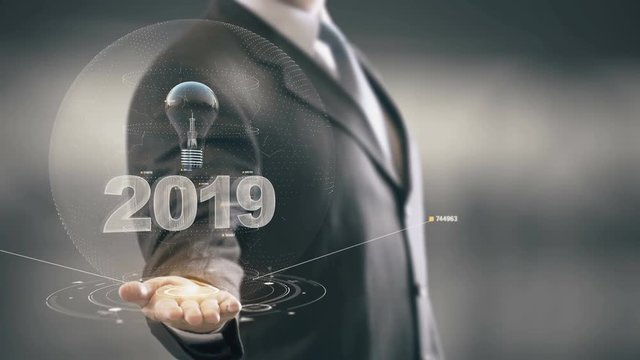 2019 With Bulb Concept Businessman Holding in Hand New technologies