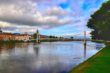 Obraz premium Overview of Inverness considered the capital of the Highlands region. The city of Inverness is situated at the mouth of the River Ness in the Moray Fjord.