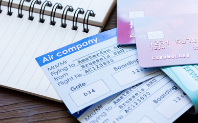 Payment online concept with cards and tickets on wooden table