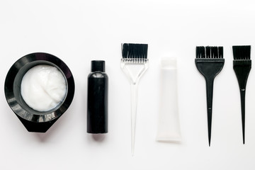 barbershop concept with hairdye tools on white background top view