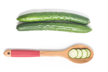 Sliced Cucumber into a spoon