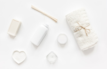 monochrome cosmetic set in SPA concept on whitebackground top view