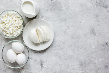 proteic breakfast concept with dairy products on table top view mock up