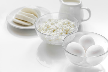 Fresh dairy products on white desk background