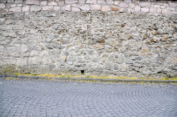 STONE WALL with pavement
