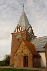 Fototapeta premium medieval brick church in rural denmark