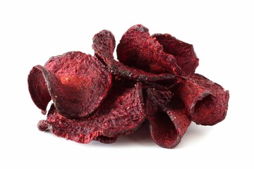 Pile of healthy beet chips isolated on a white background