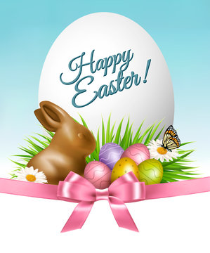 Happy Easter background. Colorful eggs and chocolate bunny on green grass. Vector.