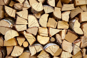 Fototapeta premium Gestapelte Holzscheite als Kamin Holz