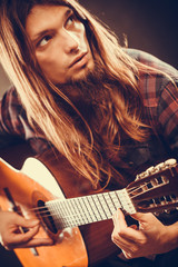 Naklejka premium Guitarist is playing the guitar.