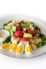 Healthy breakfast preparation on on White wooden background, top view