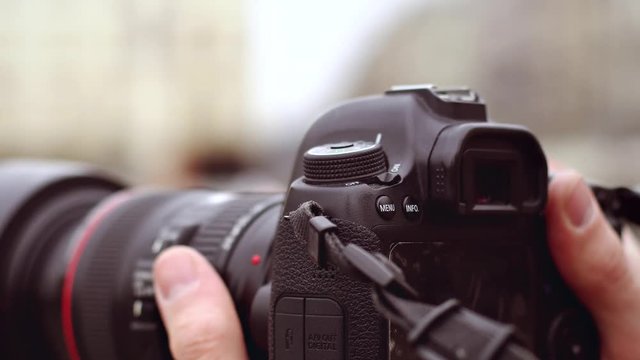 Hiker with backpack standing and photo
