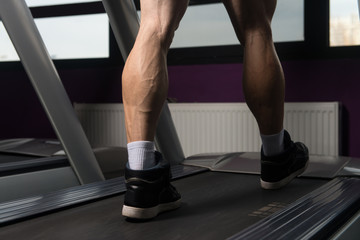 Fototapeta na wymiar Exercising On A Treadmill