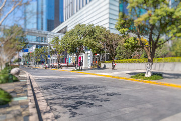 city empty traffic road with cityscape in background