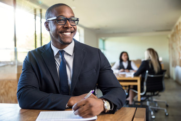 African american business man at seminar learning teaching organizing in creative environment