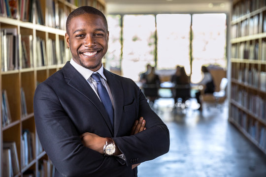 Successful black male business corporate leader portrait at office workspace meeting