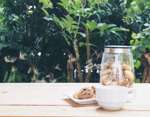 Warm coffee or tea and cookie