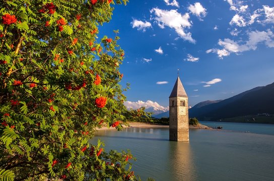 Lake Resia (Reschen) is an artificial lake in the western portion of South Tyrol. Curon Venosta, Trentino-Alto Adige, Bolzano district, Italy.
