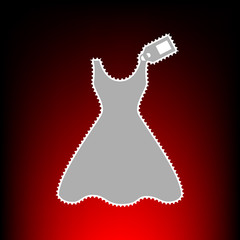 Woman dress sign with tag. Postage stamp or old photo style on red-black gradient background.