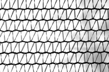 Fototapeta premium plastic color net fence pattern in black and white