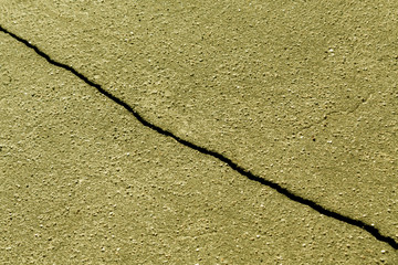 Yellow color brocken asphalt texture.