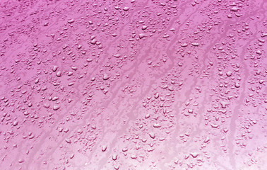 Water drops on metal surface with blur effect.