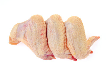 Raw chicken wings on a white background