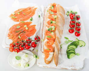 Baguette with salmon and vegetables.