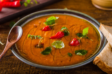 Delish tomato soup with bread and chilli