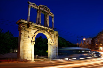 Fototapeta na wymiar Arch of Hadrian and the night city lights