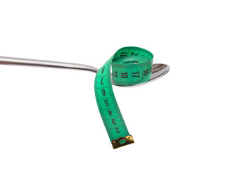   spoon and measuring tape isolated on white background
