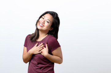 Obraz premium Young woman showing her heartfelt gratitude