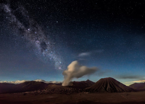Night sky and milky way galaxy above Mount Bromo volcano.